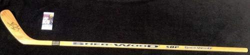 ג'ד אורטמאייר חתום על מישיגן וולברינס דגם נגן שר -ווד מקל JSA COA - מקל NHL עם חתימה